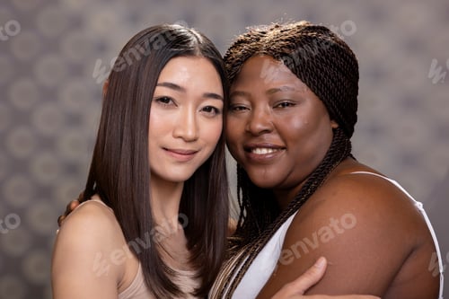 Preview: Black and asian skincare models with radiant skin and natural makeup