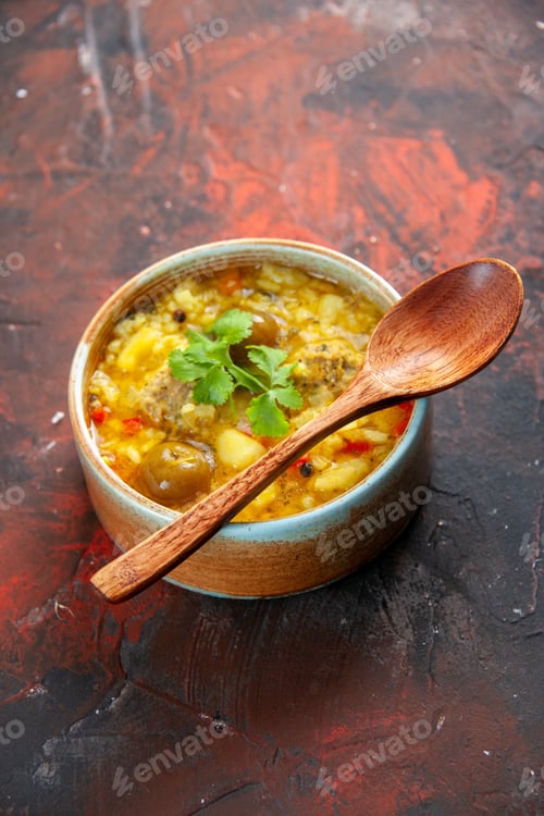 Preview: front view tasty meat soup with potatoes and rice inside little plate on dark surface cuisine dish