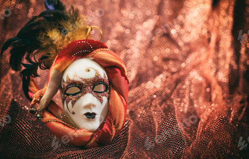 Vista previa: Carnival mask on brown blur background