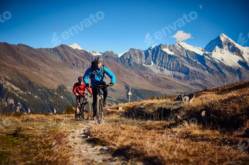 Preview: Mountain bikers on dirt track, Valais, Switzerland