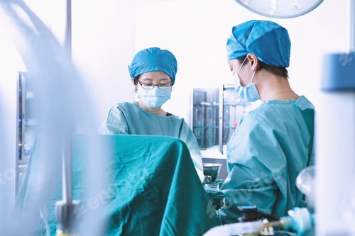 Preview: Surgeons performing surgery in maternity ward operating theatre