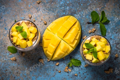 Preview: Parfait with yogurt, mango and granola top view