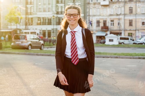 Preview: Girl teenager high school student in the city street