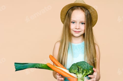 Preview: Cute Girl Holds Vegetables in a Bowl