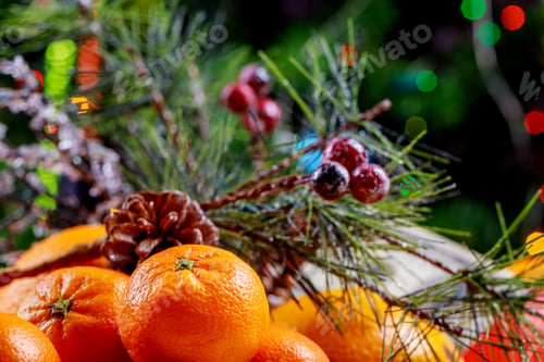 Preview: New Year and Christmas tree with gifts and mandarins.