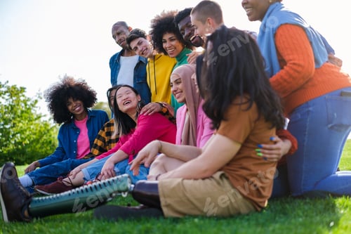 Preview: Group of different ethnic origin together having a good time together outdoors