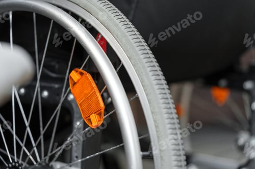 Preview: Close up view of a wheel of wheelchair