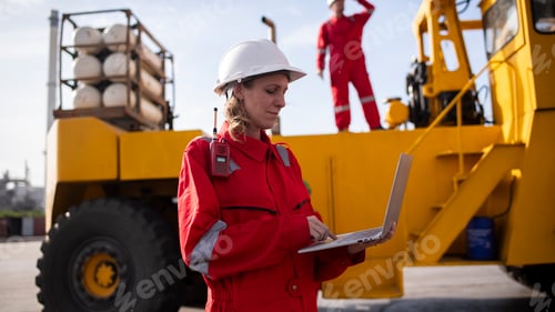 Preview: Engineer or worker standing forklift or truck vehicle are holding detail and appear to be discussing