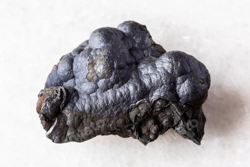 Preview: rough lithiophorite mineral on white marble