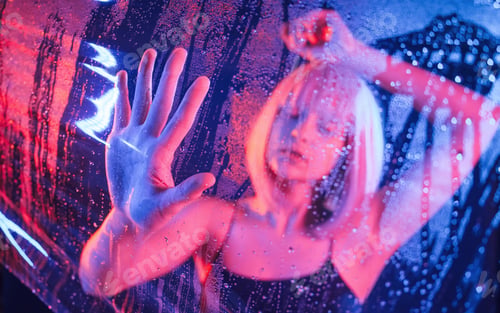 Preview: Hands are on the surface. Stylish woman with white hair is behind wet transparent plastic sheet