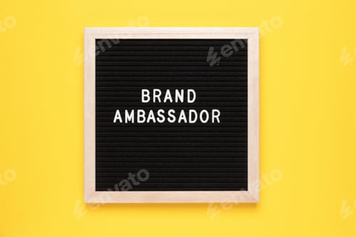 Preview: Brand Ambassador Text on letter board on yellow background