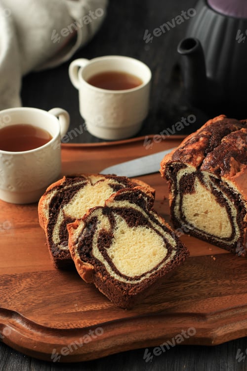Preview: Homemade Chocolate and Vanilla Marble Loaf Cake. Sliced Served with Tea or Coffe.