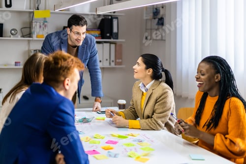 Preview: Business team working in a start-up office