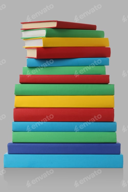 Preview: Colorful books stacked vertically on a plain backdrop
