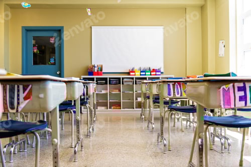 Preview: Empty Elementary School Classroom with Desks and Chairs