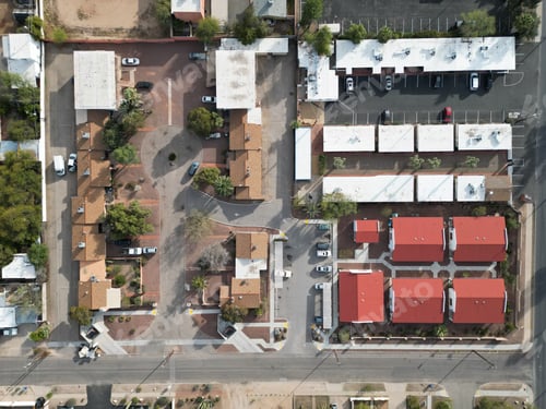 Preview: Aerial top view of a residential area with houses and parked cars