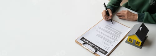 Preview: Close up view of real estate agent working with document in her office room, preparing the informat