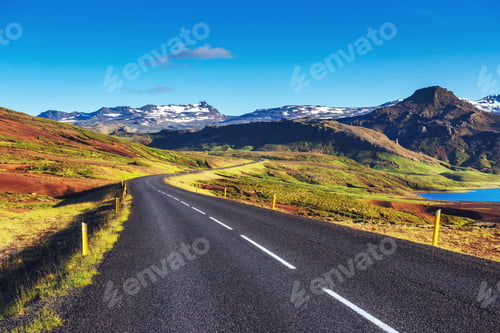 Preview: Asphalt road to the mountains Iceland. Beauty world