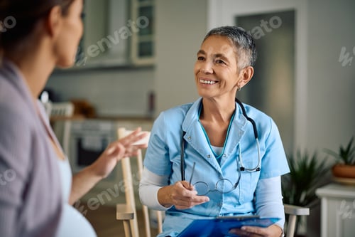Preview: Senior Woman Medical Professional Meeting with Patient