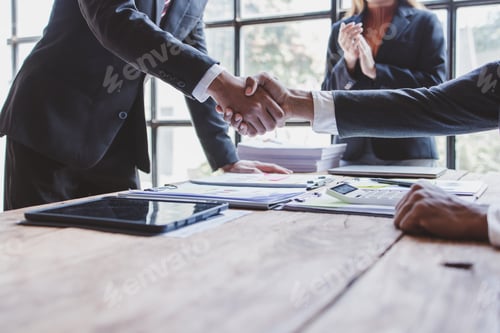 Preview: Business handshake for teamwork of business merger and acquisition,successful negotiate,hand shake,