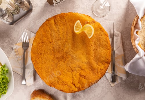 Preview: Flat lay of giant breaded chicken