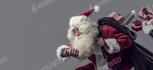 Preview: Santa Claus running and delivering gifts