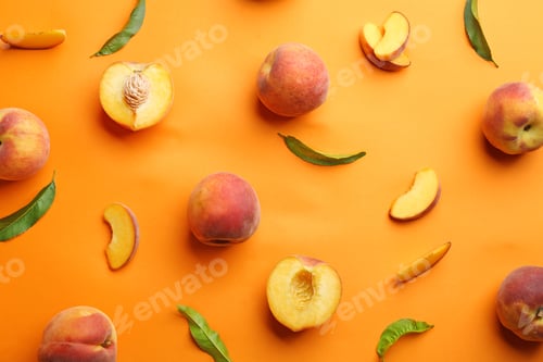 Preview: Flat lay composition with fresh peaches on orange background