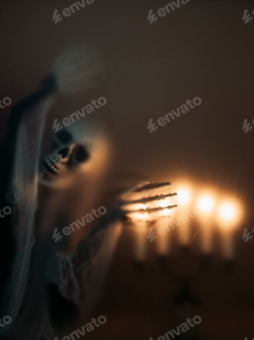 Preview: Mysterious creature with skull under the night light for Halloween