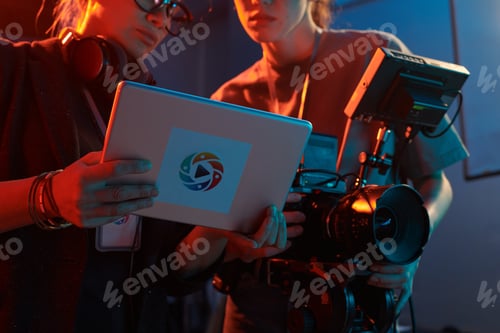 Preview: Video Production Crew Discussing Footage