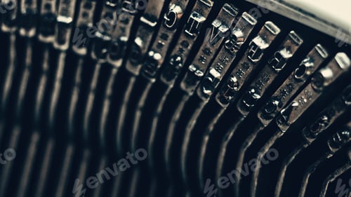 Preview: Letters and numbers on typo keys of an old manual typewriter