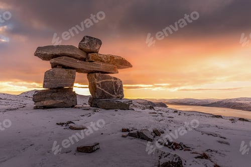Preview: Inuksuk, a manmade stone landmark, cairn built by peoples of the Arctic region of North America