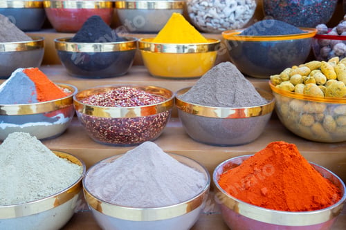 Preview: Traditional spices market. Pots and wooden tubs stand in row with colorful tea, spices, fruits