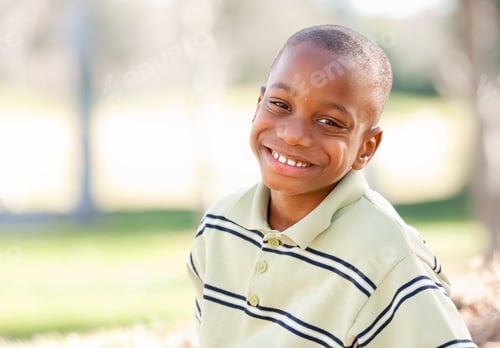 Preview: Happy Young African American Boy in the Park.