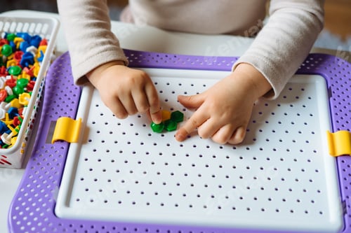Preview: Toddler Plays with Pegboard Game at Home