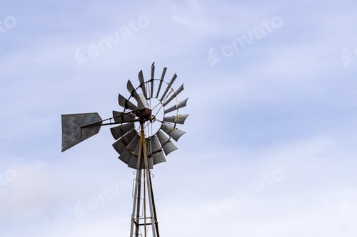 Preview: Old water pumping windmill with a tiny bird on top, Joseph Grant County Park, San Jose, California