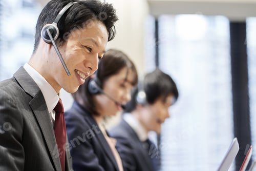 Preview: Asian business person responding at the customer center