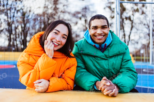 Preview: Multiracial young couple of lovers dating outdoors in winter