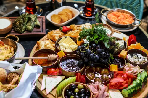 Preview: breakfast set olives cheese cucumber jams honey side view