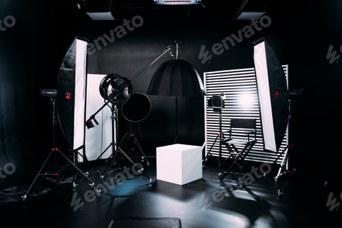 Preview: Modern photo studio with professional equipment. Black cyclorama.
