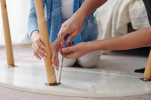 Preview: Hands Fixing Broken Table