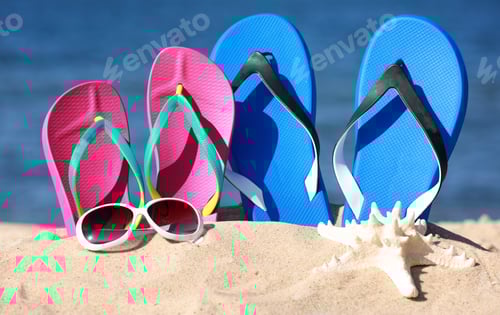 Preview: Composition with beach accessories on sand near sea in summer