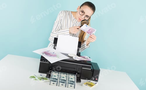 Preview: Attractive woman prints cash with magnifying glass
