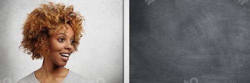 Preview: Indoor shot of beautiful dark-skinned female student with Afro hairstyle and nose-ring looking away