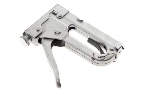Preview: foil construction stapler and a white isolated background