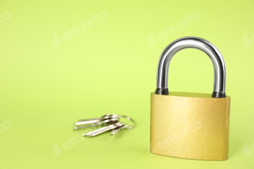 Preview: Modern padlock and keys on light green background. Space for text