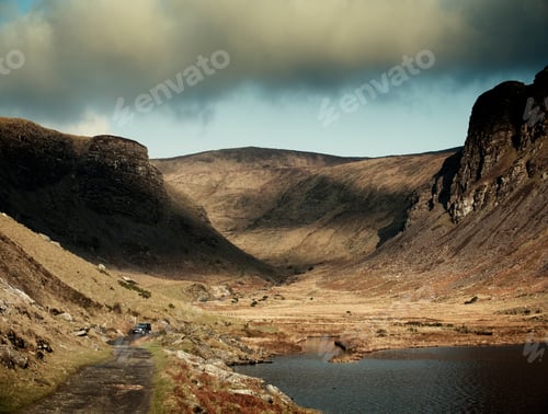 Preview: Off road vehicle parked on lakeside dirt track, Dingle, Co Kerry, Ireland
