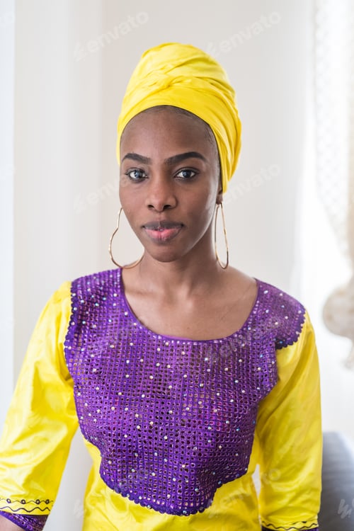 Preview: portrait young black woman outdoor wearing traditional clothing