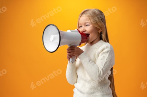 Preview: Child girl using megaphone against yellow background