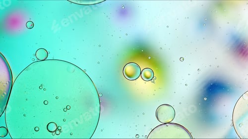 Preview: Abstract Colorful Food Oil Drops Bubbles and spheres Flowing on Water Surface