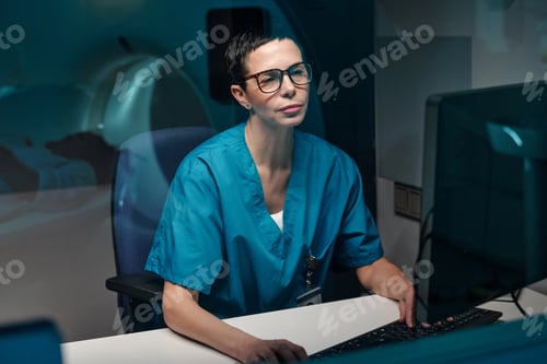 Preview: Portrait of Female Doctor Analyzing Medical Data on Computer